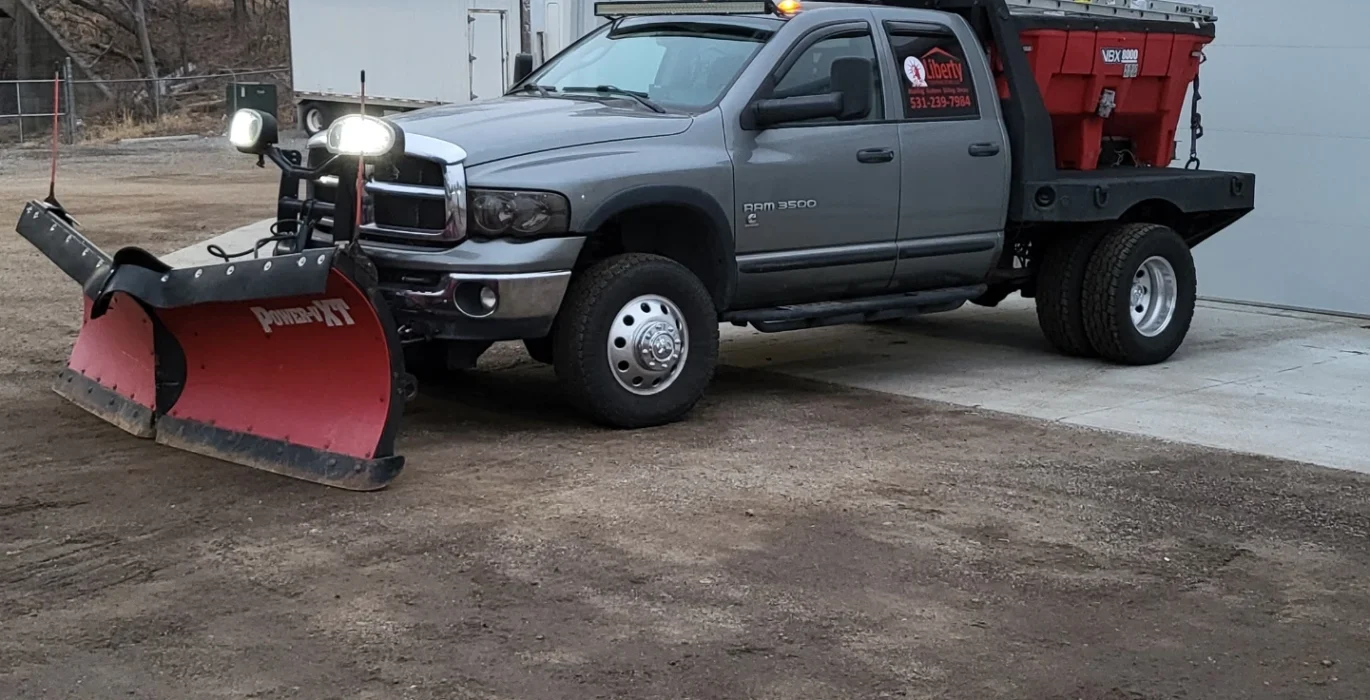 Liberty Contractors snow removal service truck ready for commercial Omaha properties.
